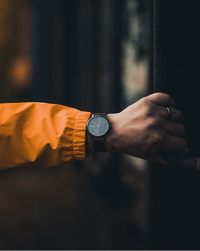 men holding door wearing adventurister dark with reindeer leather